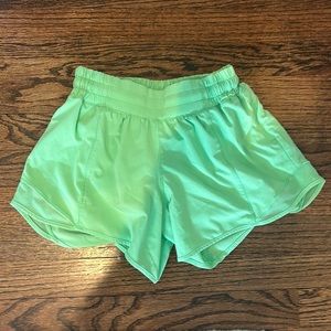 Hotty hot low rise short lined  4” in the color “scream green light”.
